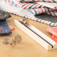 Load image into Gallery viewer, Elna Metal Bobbins,<BR>30 Bobbins per Box